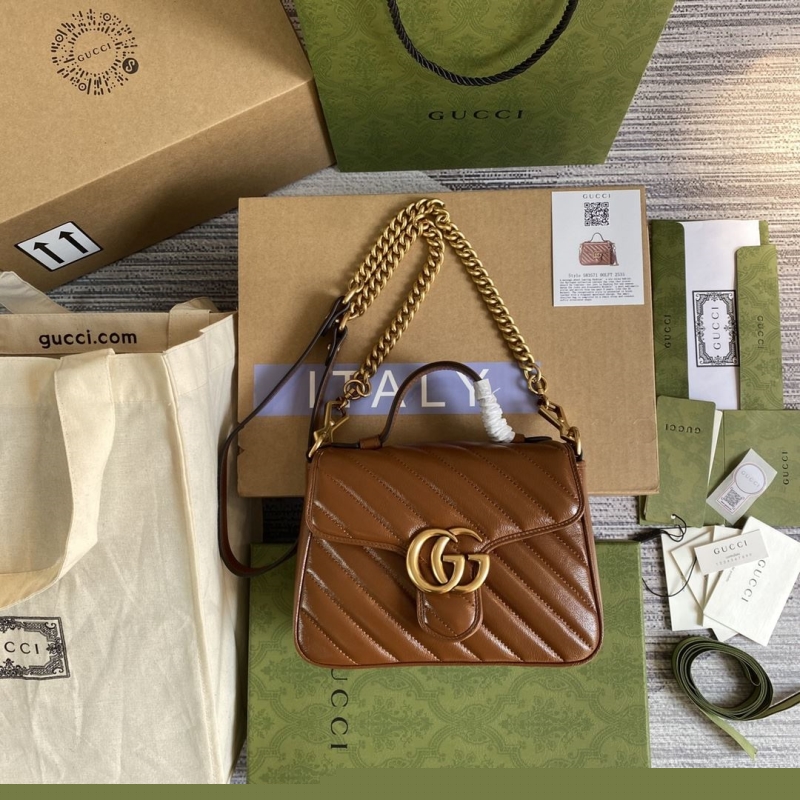 G*u*i top handle bags